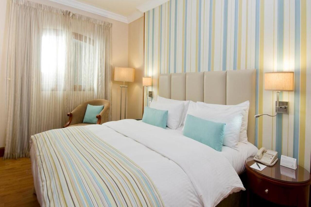 Danat Al Ain Resort Exteriér fotografie A bedroom
